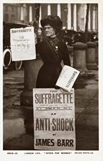 Postcard of a Suffragette Holding Newspapers. Postcard of a Suffragette Holding Newspapers Postcard of a Suffragette Holding Newspapers. Postcard of a Suffragette Holding Newspapers