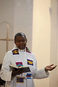 Priest celebrating a sunday service at Holy Trinity Dalston Priest celebrating a sunday service at Holy Trinity Dalston
