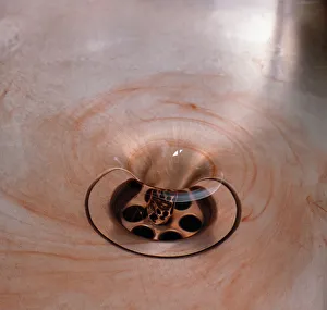 <b class=qtipBold><figcaption>Red water flowing down a drain</figcaption></b><br><em>© Dorling Kindersley/UIG</em> Red water flowing down a drain