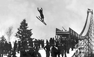 <b class=qtipBold><figcaption>Skier Off A Jump</figcaption></b><br>United States: c. 1922. A photo showing a skier as he takes flight from a very tall and very narrow ski jump.<br><em>© Underwood Archives/UIG</em> Skier Off A Jump