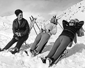 Skiers Basking In The Sun Skiers Basking In The Sun