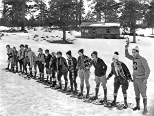 <b class=qtipBold><figcaption>Snowshoe Race In The Mountains</figcaption></b><br>Big Bear, California: 1925. A scene from 'The Collegians' being filmed at Big Bear, California. George Lewis and Dorothy Gulliver are at the far right. Gulliver was the former 'Miss Salt Lake City'.<br><em>© Underwood Archives/UIG</em> Snowshoe Race In The Mountains