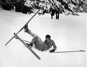 <b class=qtipBold><figcaption>A Soft Landing On Christmas</figcaption></b><br>Lake Placid, New York: December 25, 1927 Skiing often involves falling, so it's a good idea to keep in good humor while attempting this fun sport, especially on Christmas Day.<br><em>© Underwood Archives/UIG</em> A Soft Landing On Christmas