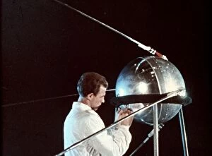 Sputnik Gallery: Soviet technician working on sputnik 1, 1957