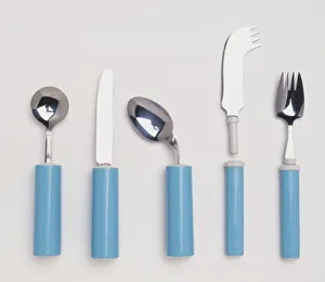 Specially shaped cutlery for someone with a weak grip or the use of one hand Specially shaped cutlery for someone with a weak grip or the use of one hand