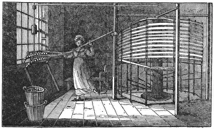Spitalfields silk worker winding silk onto the warping frame: London. From Saturday Magazine London Spitalfields silk worker winding silk onto the warping frame: London. From Saturday Magazine London