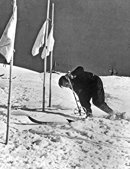 <b class=qtipBold><figcaption>Spring Skiing At Sun Valley</figcaption></b><br>Sun Valley, Idaho: c. 1936 Hannes Schroll, the Austrian ski champion goes in for some spring skiing at Sun Valley.<br><em>© Underwood Archives/UIG</em> Spring Skiing At Sun Valley