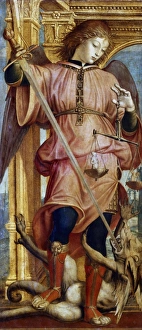 St Michael the Archangel fighting dragon with sword. In left hand he holds balance St Michael the Archangel fighting dragon with sword. In left hand he holds balance