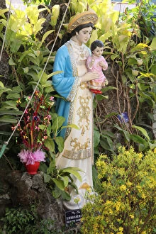 Statue Gallery: Statue of the Virgin Mary in the garden of a catholic church