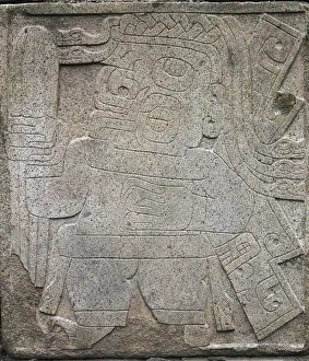 Stele with feline figure holding a war club from Chavin de Huantar, Peru, Nazca culture Stele with feline figure holding a war club from Chavin de Huantar, Peru, Nazca culture