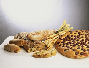 Stuffed herb bread, sprinkled with rosemary and salt, fruit bread, Italian bread rolls, hard crust loaf and breadsticks Stuffed herb bread, sprinkled with rosemary and salt, fruit bread, Italian bread rolls, hard crust loaf and breadsticks