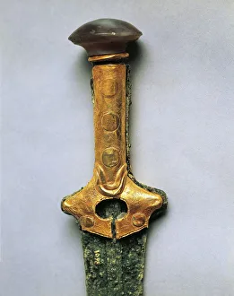 Sword with gold hilt and bronze blade, from tomb 36, Necropolis of Zapher, Knossos, Greece Sword with gold hilt and bronze blade, from tomb 36, Necropolis of Zapher, Knossos, Greece