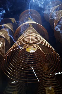 Taoist Ong pagoda. Incense coils hang from the ceiling. Can Tho. Vietnam Taoist Ong pagoda. Incense coils hang from the ceiling. Can Tho. Vietnam