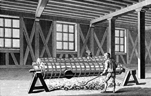 tapping furnace to allow molten metal to run into the moulds