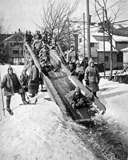 <b class=qtipBold><figcaption>Toboggan Slide</figcaption></b><br>Rochester, New York: c. 1911. Children sliding on a wooden chute at an open-air school in Rochester, New York.<br><em>© Underwood Archives/UIG</em> Toboggan Slide