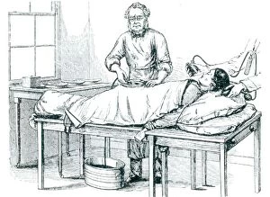 T.S. Wells performing operation