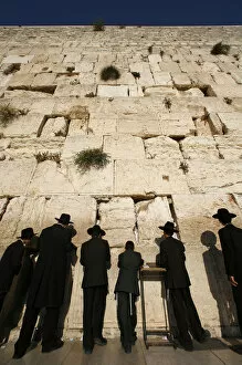 Images Dated 25th May 2000: Ultra-orthodox Jewish men pray at the Western Wall in the Old City of Jerusalem