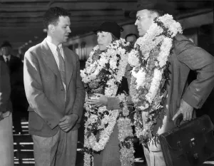 Prints of Honolulu, Hawaii: December 27, 1934. Amelia Earhart and her husband, George Putnam, are greeted by Lt. Johnson of the Naval Fleet Air Base Pioneer Prints: Amelia Earhart Print in Honolulu, Hawaii