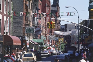 USA, New York, Manhattan, Lower East Side, busy street with Italian restaurants and shops USA, New York, Manhattan, Lower East Side, busy street with Italian restaurants and shops