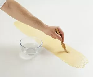 Basting Brush Gallery: Using basting brush to apply water to pasta