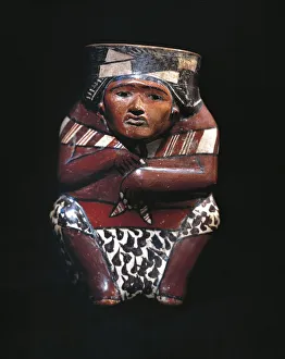 Vase depicting a hunter with an animal skin shawl, Nazca culture, Pre-Inca civilization Vase depicting a hunter with an animal skin shawl, Nazca culture, Pre-Inca civilization