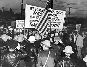 <b class=qtipBold><figcaption>War Veterans Picket MGM Studio</figcaption></b><br>Los Angeles, California: October 1, 1946. Police salute the American flag as it passes by at the head of a parade of pickets demonstrating at the MGM Studio in Hollywood.<br><em>© Underwood Archives/UIG</em> War Veterans Picket MGM Studio