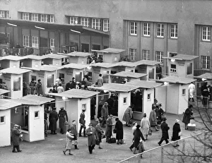 West berliners crossing over to visit relatives in east berlin in accordance with a recently signed treaty allowing West berliners crossing over to visit relatives in east berlin in accordance with a recently signed treaty allowing