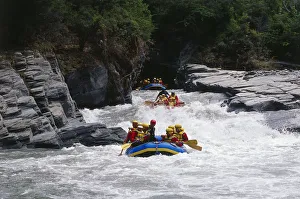 White-water rafting through narrow gorges and thundering rapids of the Kawarau White-water rafting through narrow gorges and thundering rapids of the Kawarau