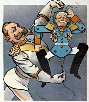 Wilhelm II holding strings of wooden jumping toy Wilhelm II holding strings of wooden jumping toy