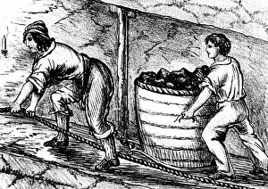 Woman and boy underground in coal mine drawing cart containing 3-4 cwt of coal - Bolton Woman and boy underground in coal mine drawing cart containing 3-4 cwt of coal - Bolton