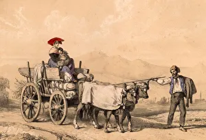 Woman and child in traditional dress riding on a cart full of sacks. The cart is Woman and child in traditional dress riding on a cart full of sacks. The cart is