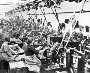 <b class=qtipBold><figcaption>Women sewing in garment factory</figcaption></b> Women sewing in garment factory