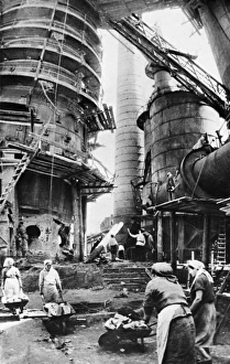 World war 2, soviet civilians, many of them women, restoring the foundry shop of the 2nd World war 2, soviet civilians, many of them women, restoring the foundry shop of the 2nd