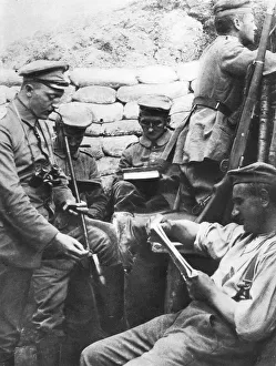 World War I: German soldiers reading, writing and smoking in the trenches during World War I: German soldiers reading, writing and smoking in the trenches during
