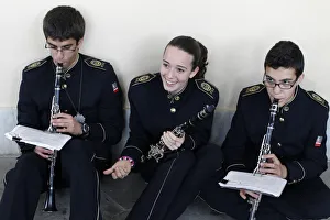 Easter Week Gallery: Young musicians getting ready for an Easter week procession