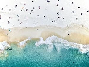 Images Dated 25th September 2017: An aerial beach shot of people sitting on the beach