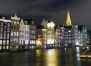 Images Dated 19th December 2014: Amsterdam canal facing houses and Old church spire