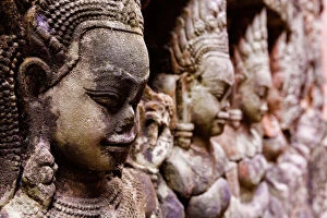 Buddhist Architecture Collection: Angkor Wat Temple Wall Faces Detail