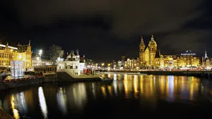Images Dated 19th December 2014: Basilica of St Nicholas and train station at night