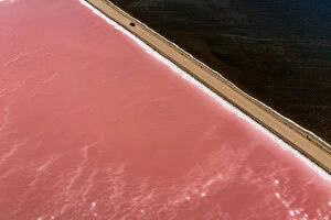 Images Dated 15th January 2019: Car driving past Lake MacDonnell (Pink Lake) - Aerial