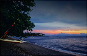 Coastal dusk, Senggigi beach, on the Island of Lombok, Indonesia Coastal dusk, Senggigi beach, on the Island of Lombok, Indonesia