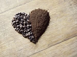 Choice Collection: Coffee beans and grounds forming a heart shape