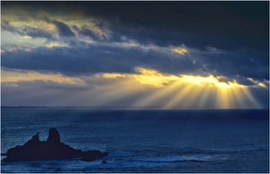 Crepuscular light at dawn, Eagles nest, Shack bay near Inverloch, Victoria Crepuscular light at dawn, Eagles nest, Shack bay near Inverloch, Victoria