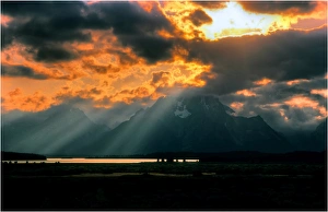 Crepuscular rays over the Grand Teton mountains, Wyoming Crepuscular rays over the Grand Teton mountains, Wyoming