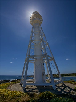 Currie lighthouse and sunstar, King Island, Bass Strait, Tasmania Currie lighthouse and sunstar, King Island, Bass Strait, Tasmania