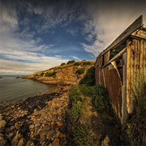 Derelict boat-shed on the coastline at Hillgrove, New Zealand, south island Derelict boat-shed on the coastline at Hillgrove, New Zealand, south island