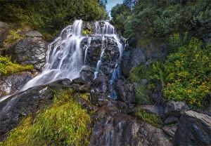 Flowing water over Falls Creek waterfall in the Alpine mountainous region of north east Flowing water over Falls Creek waterfall in the Alpine mountainous region of north east