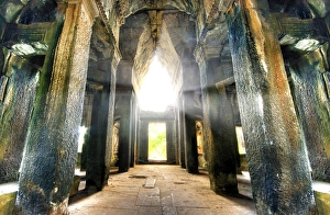 Light Shining Through the Openings Into the Interior of Angkor Wat, Siem Reap, Cambodia Light Shining Through the Openings Into the Interior of Angkor Wat, Siem Reap, Cambodia