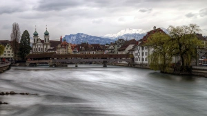 Lucerne old town Jesuit Church and wooden bridge Lucerne old town Jesuit Church and wooden bridge
