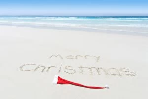 Clean Gallery: Merry Christmas written on a beach